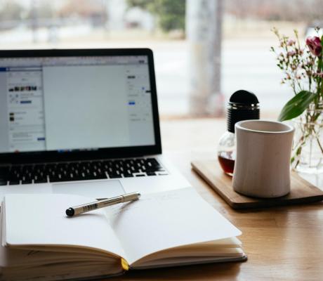 A laptop and a notebook