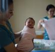 Nurse holding a baby